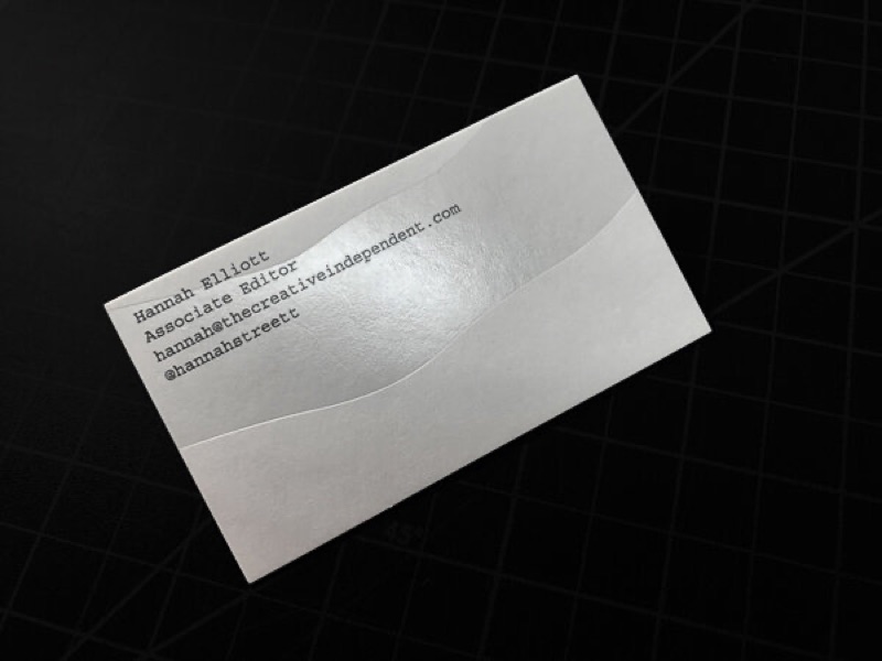 Clear foil wave over typewriter type business card