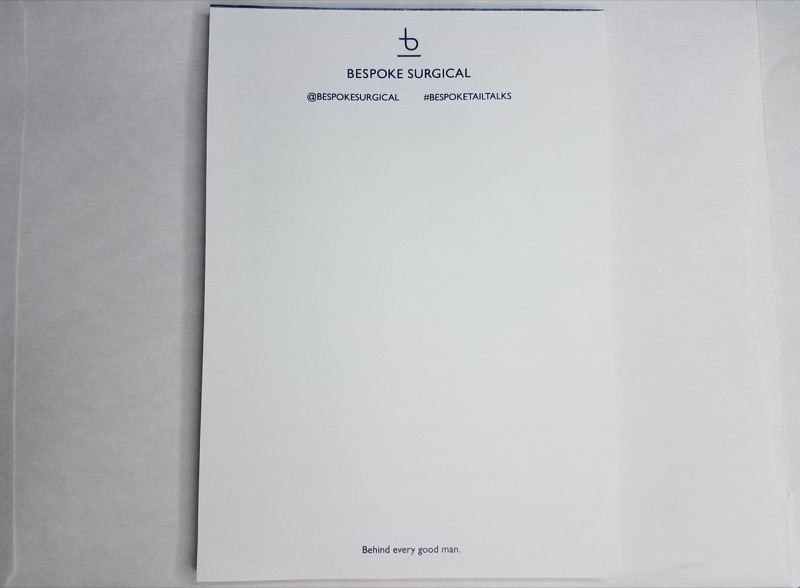 Company letterhead suite in offset blue on grey paper