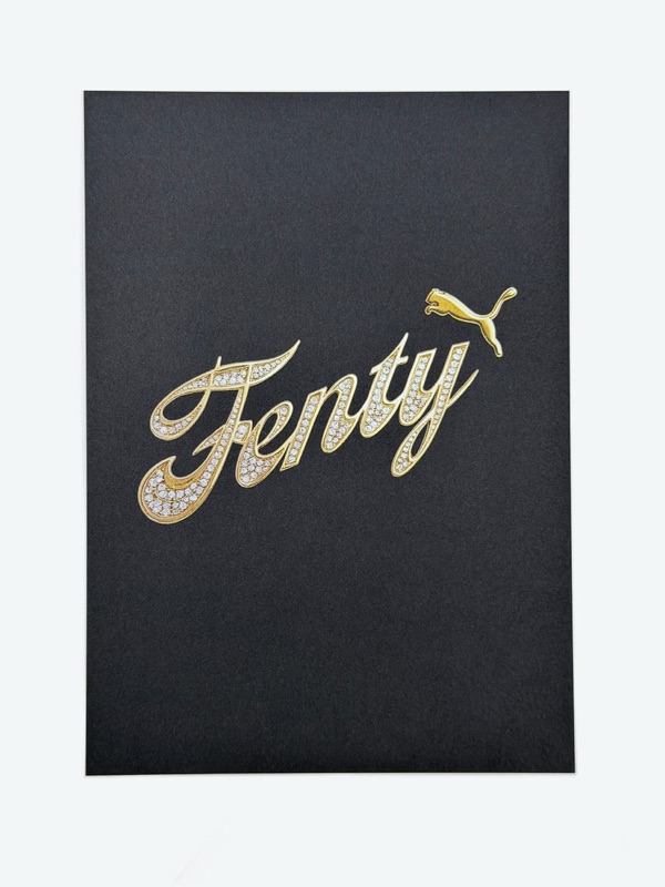 Crystal-embellished gold script on black folder