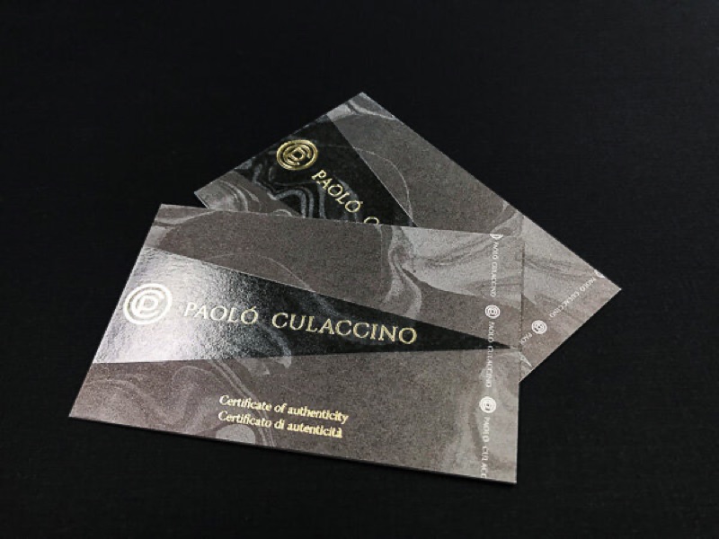 Certificate cards with gloss pattern over metallic stock
