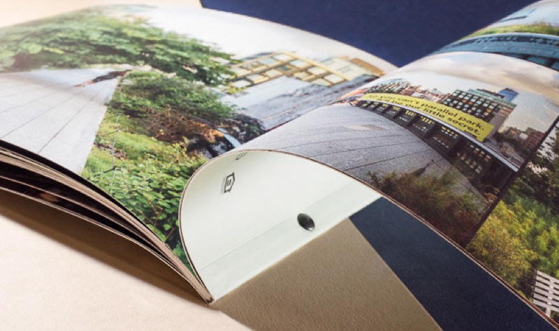 Grommet-bound book with full color photography