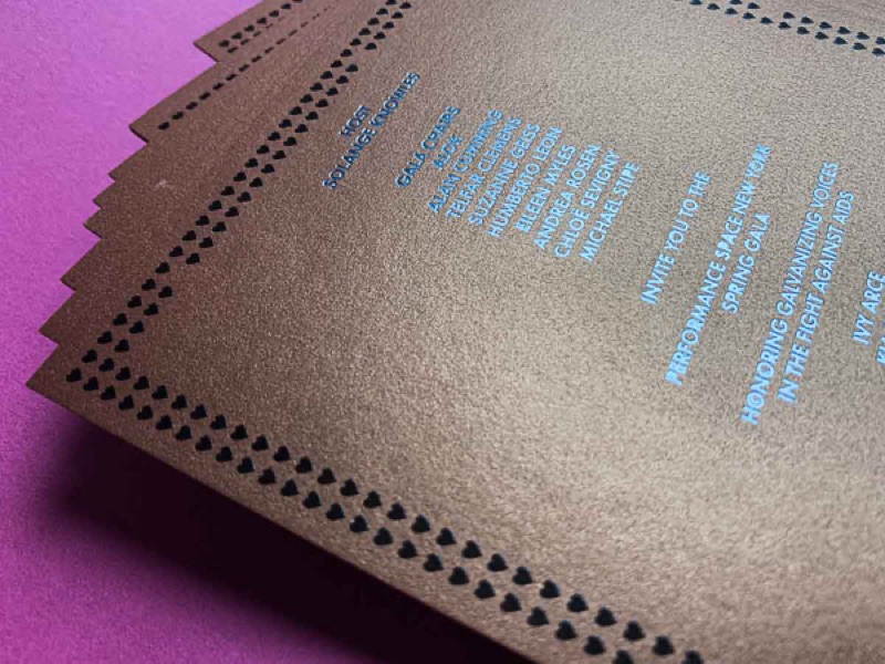 Letterpress event invitation on copper metallic paper
