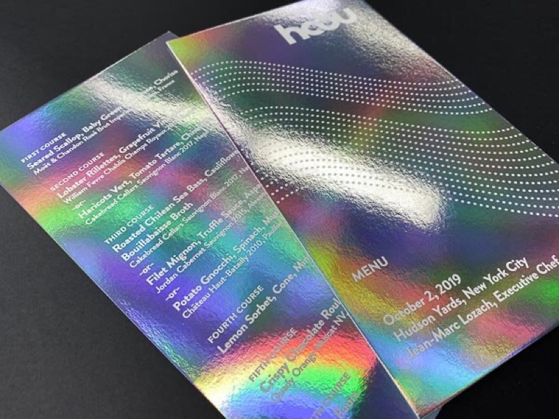 Letterpress event menu on iridescent paper