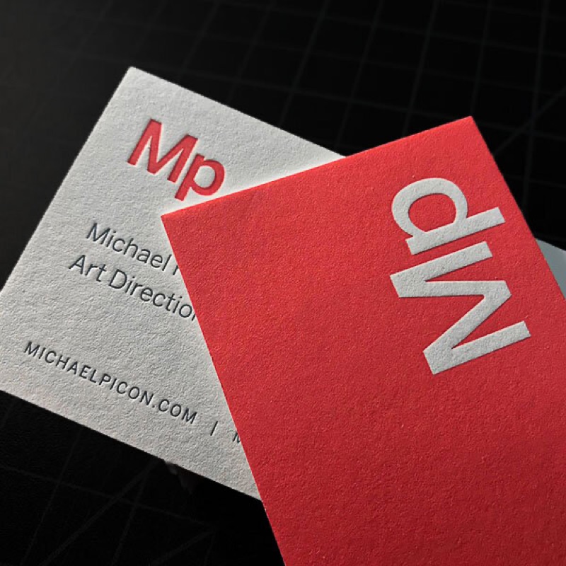 Letterpress monogram business cards in red and white