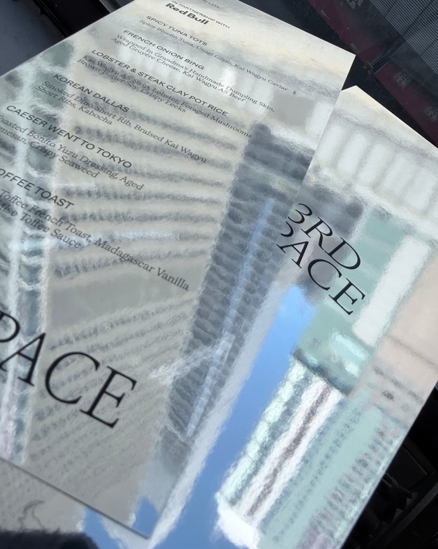 Menus on mirror paper reflecting the street