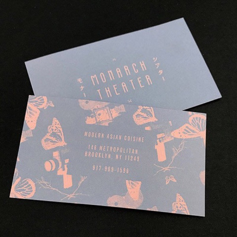 Peach ink on dusty blue theater business cards