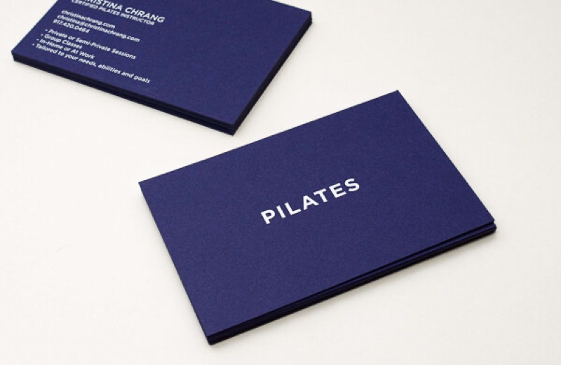 White ink on navy European business cards